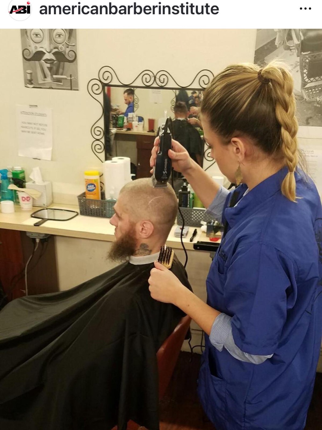Student blow-dries client's hair
