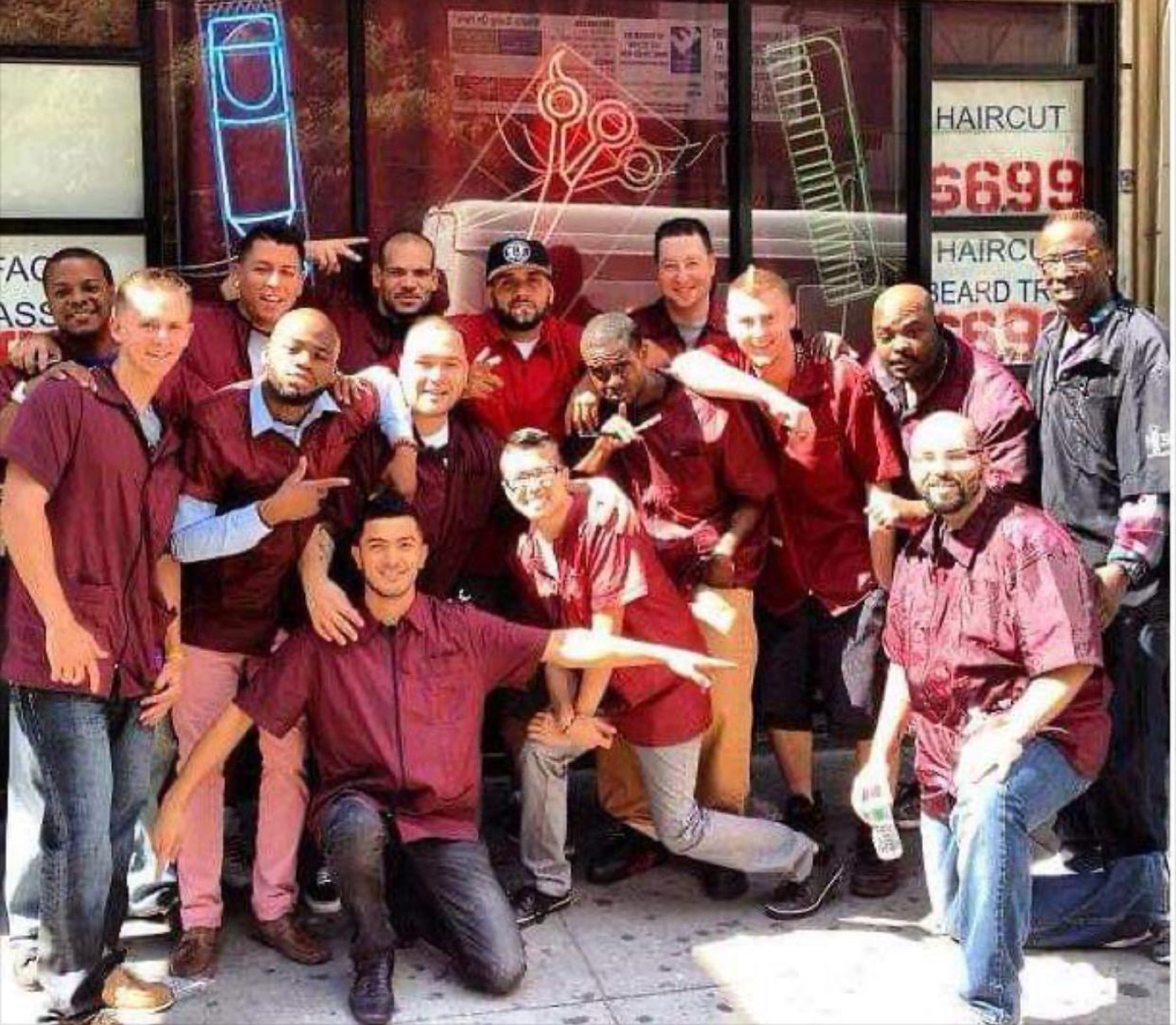 Large group of barbers outside shop