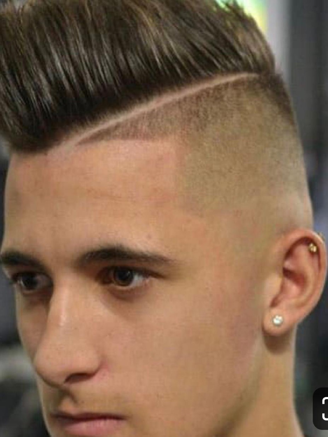 Finished pompadour fade with design, ABI student work