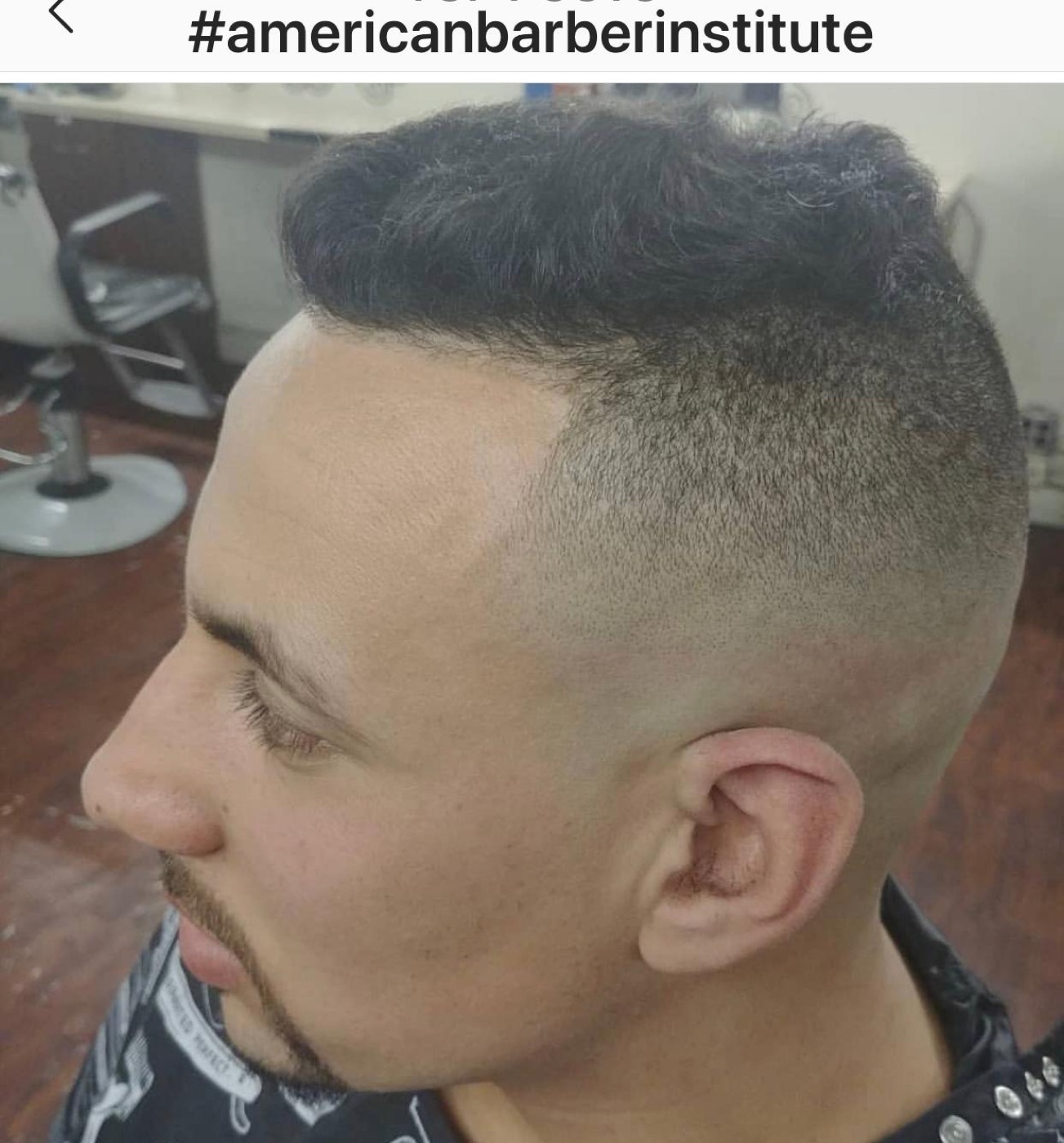 Short textured fade haircut profile