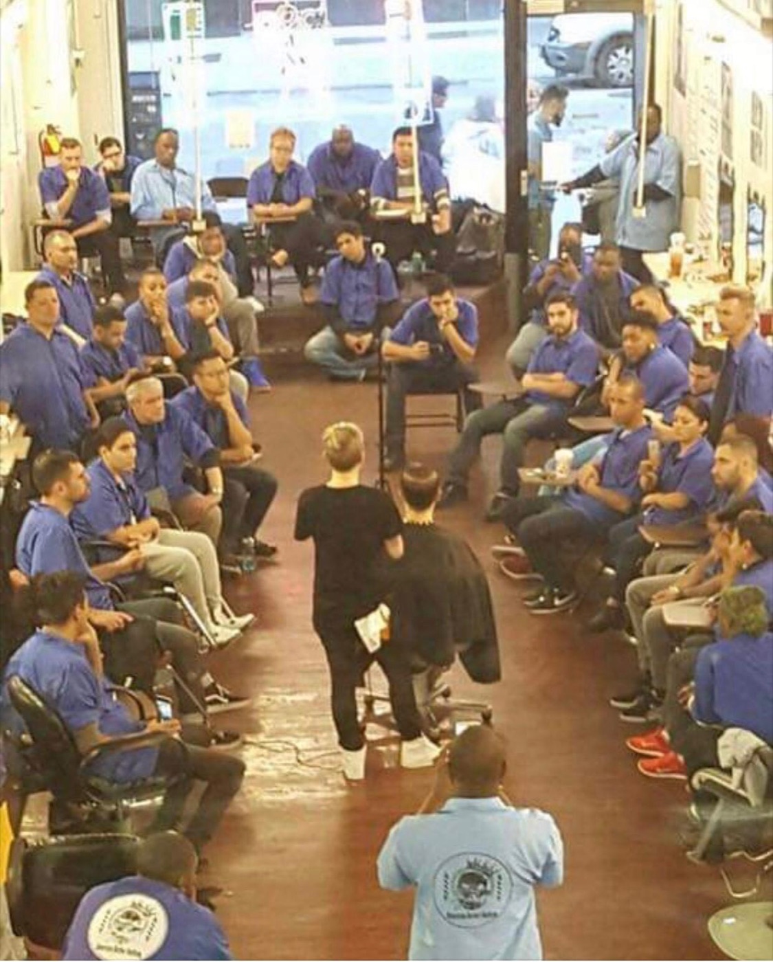Students gathered in barbershop classroom session